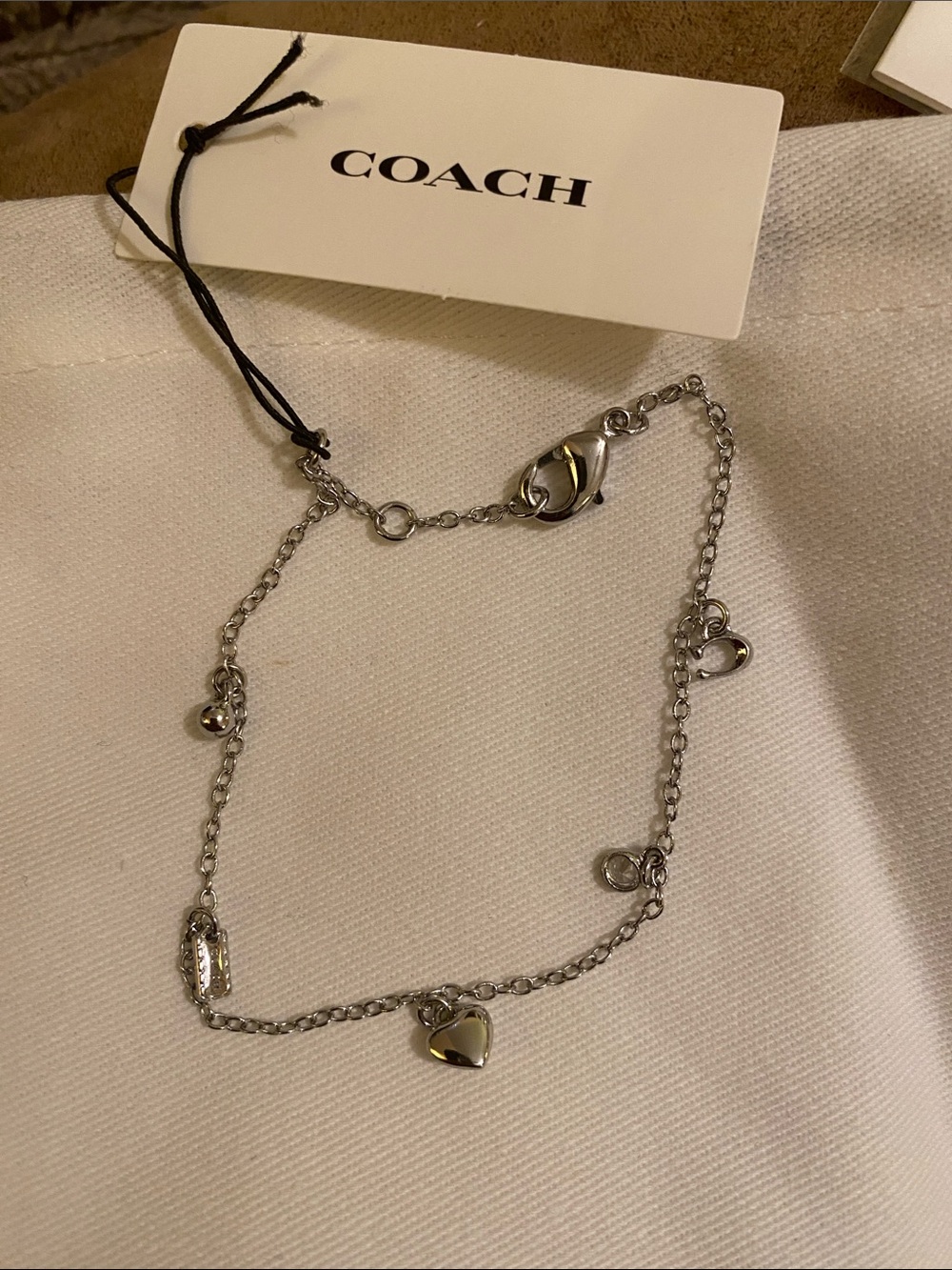 Coach Silver-Tone Heart Charm Bracelet